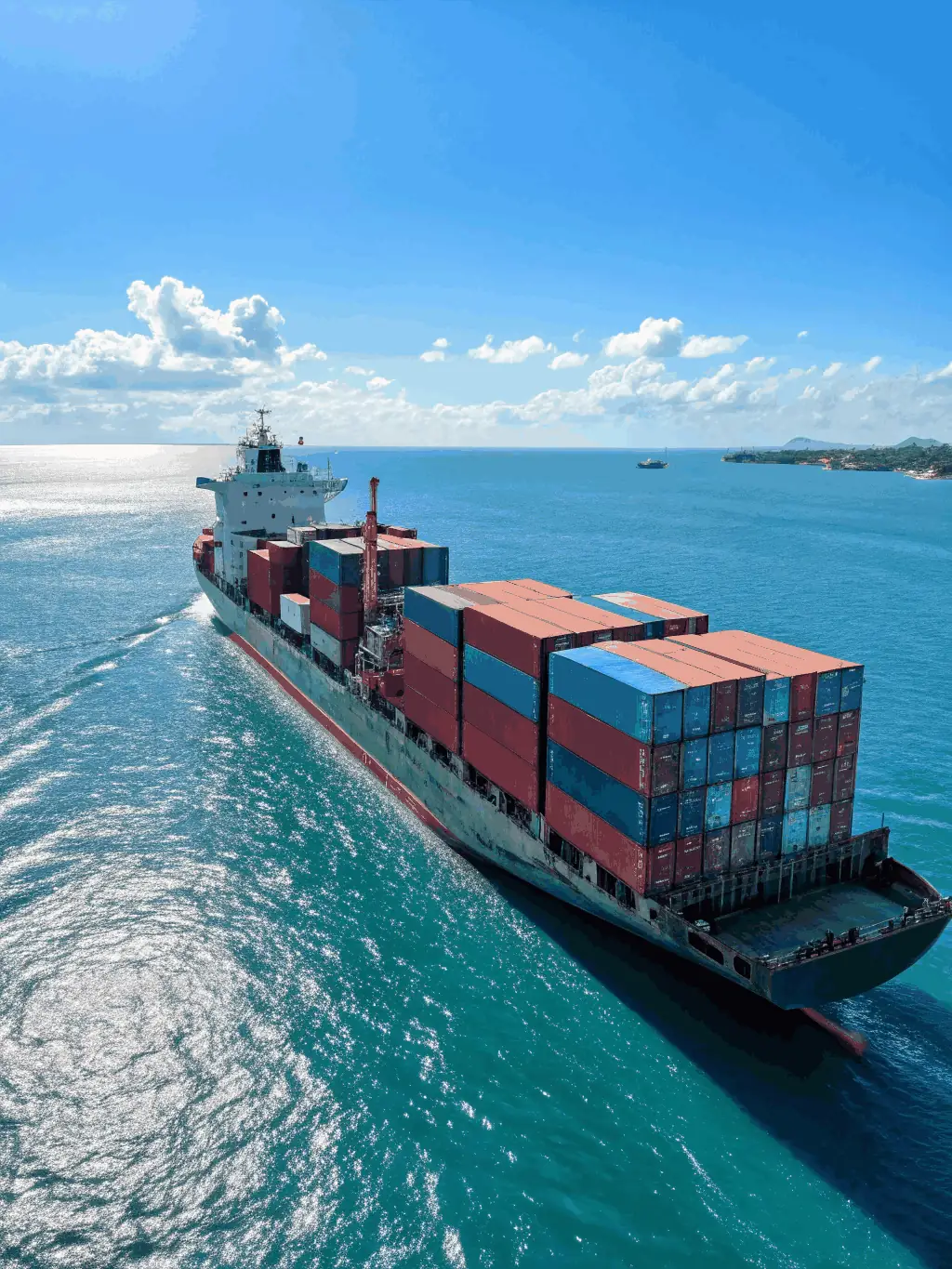 A modern cargo ship transporting vehicles across the ocean, symbolizing Knot Service LLC's vehicle export consulting services.